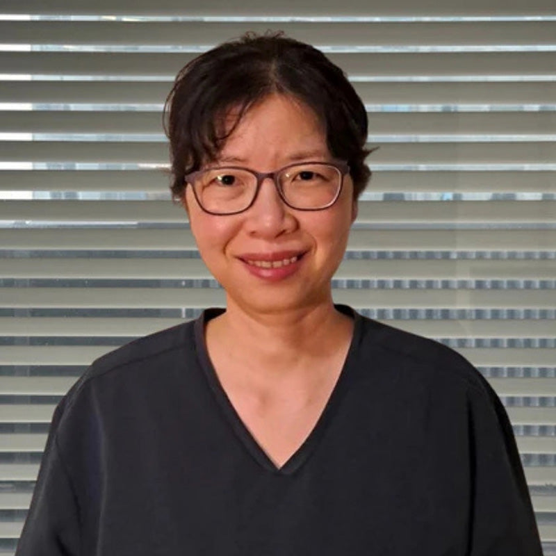 Wendy the WSD pathologist against a striped background